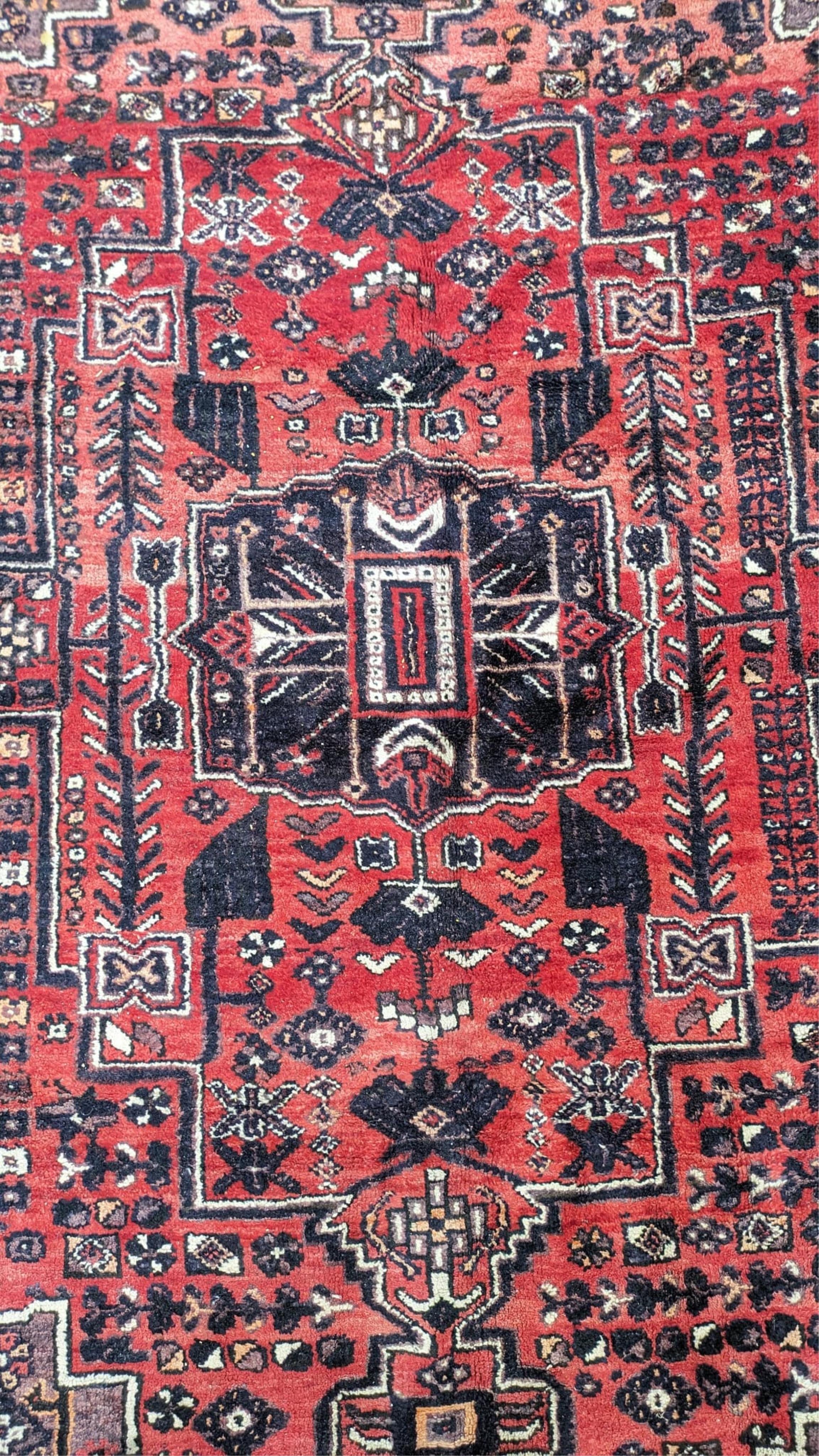 A Persian Shiraz carpet, 300 x 210cm